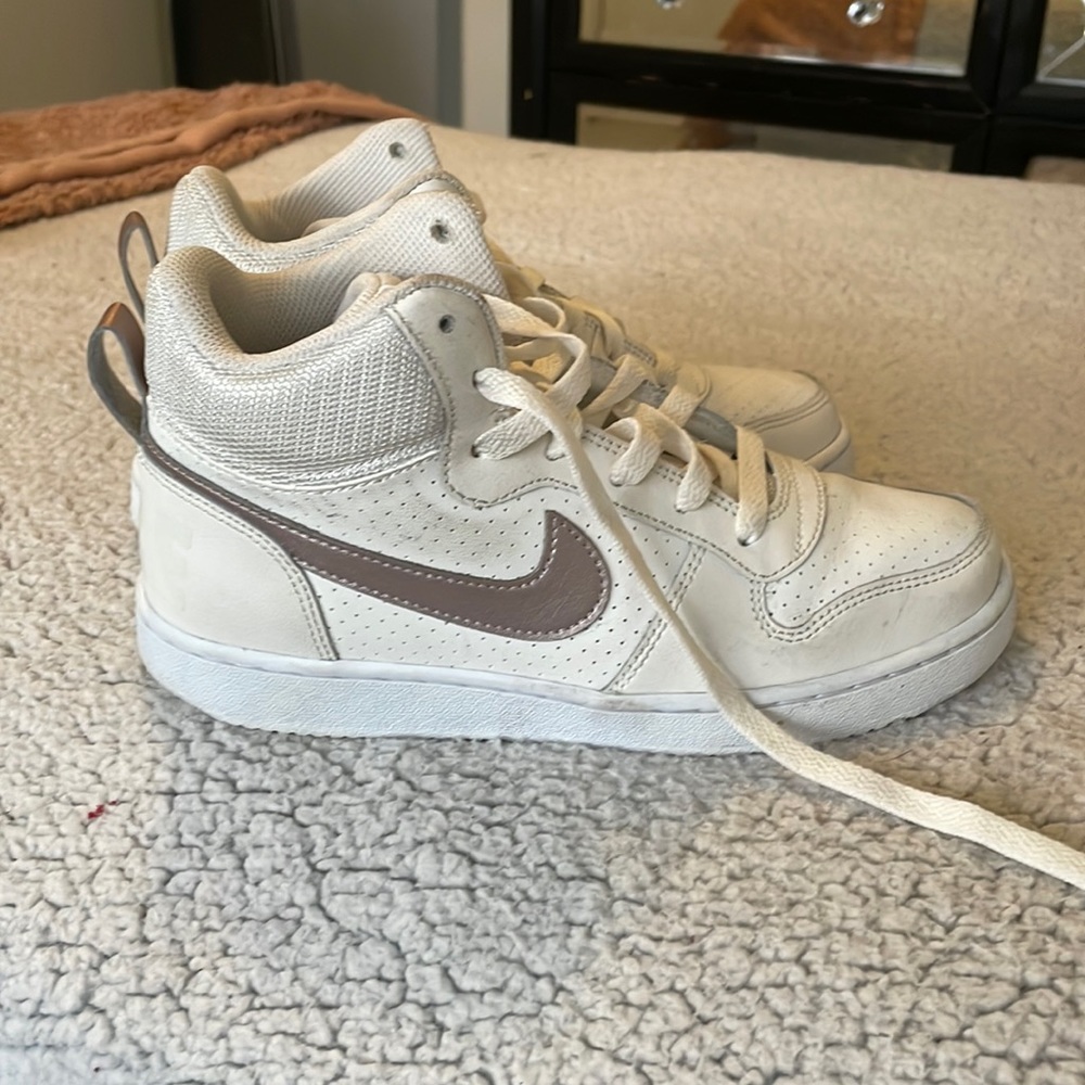 Girls high top nike shoes with rose gold swoosh